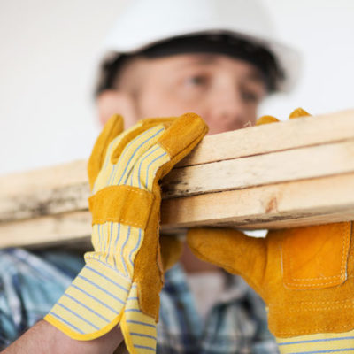 Guy-carrying-wood